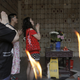 A family pays respect to their ancestors at a private columbaria on the Double Ninth Festival or Chung Yeung Festival, in Hong Kong, Wednesday, Oct. 21, 2015. The Double Ninth Festival, observed on the ninth day of the ninth month in the Chinese lunar calendar, is a day to respect and remember ancestors. The ritual is widely followed in Hong Kong among people in the Chinese community. (AP Photo/Vincent Yu)